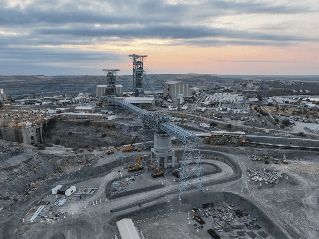 Aerial dusk view of the headgear and winder towers at DBCM Venetia Mine