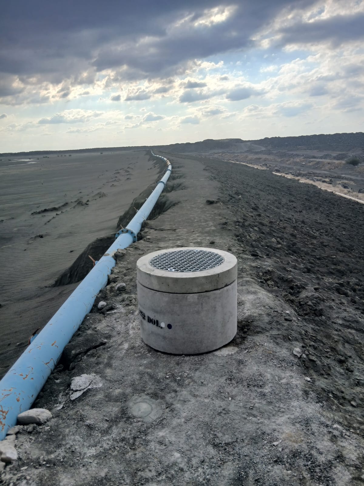 Bulk water pipeline section laid in a trench with compaction roller, Mbombi Holdings civil works